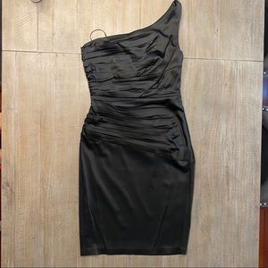 One shoulder side ruched black satin dress.